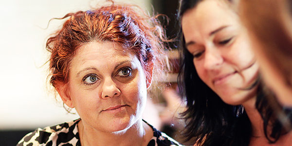 Group of three women working together