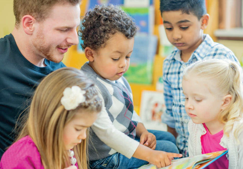 Early learning educators reads to children