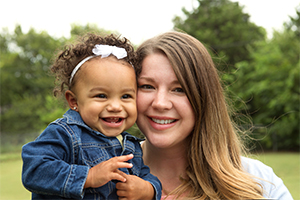 Mixed race mother and daughter.