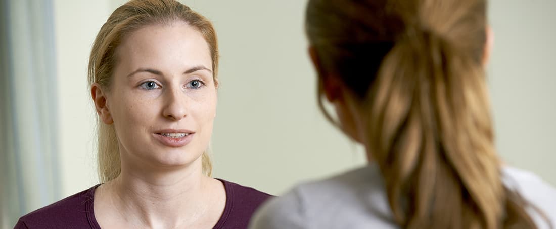 two women in tense conversation